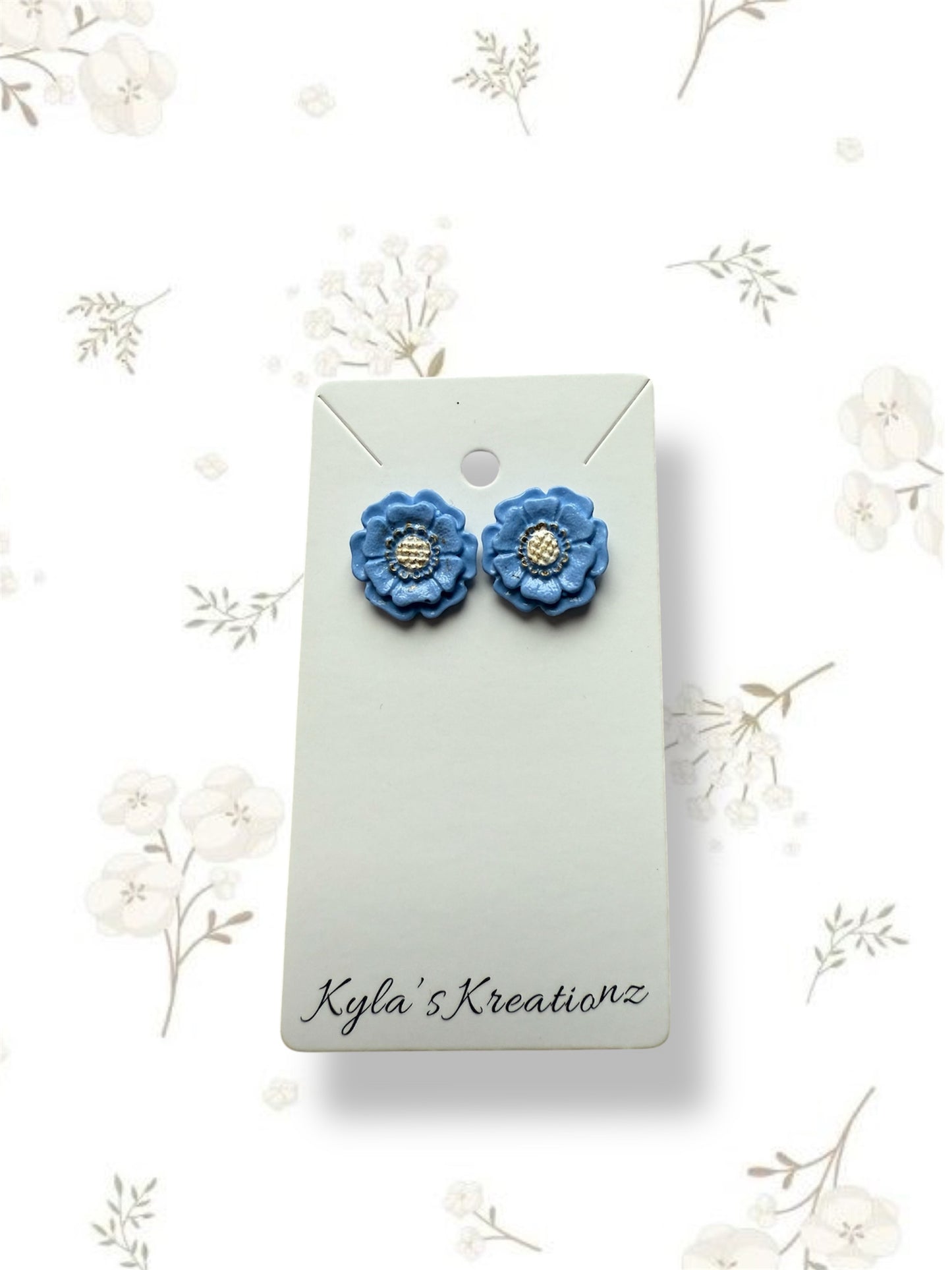 Blue flower studs